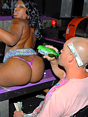 Super hot big booty stripper darling sucks on a cock by the pole then rides it hard in the lap..